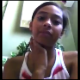 A light-skinned black girl records herself taking a shit while sitting on a toilet and rapping. Although poop sounds are not audible, she shows us her nice finished product in the toilet.
